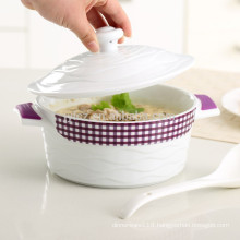 Ceramic casseroles with heat-resistant silicone handle grips